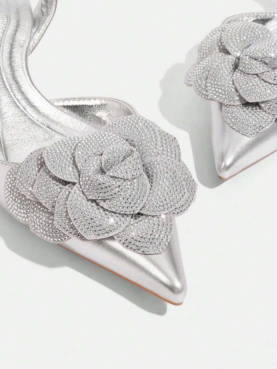 CUCCOO TILAWA Women's Fashion Metal Rhinestone Flower Decor Pointed Toe Low Heel Backstrap Pumps silver-10