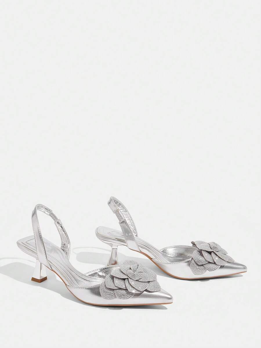 CUCCOO TILAWA Women's Fashion Metal Rhinestone Flower Decor Pointed Toe Low Heel Backstrap Pumps silver-3